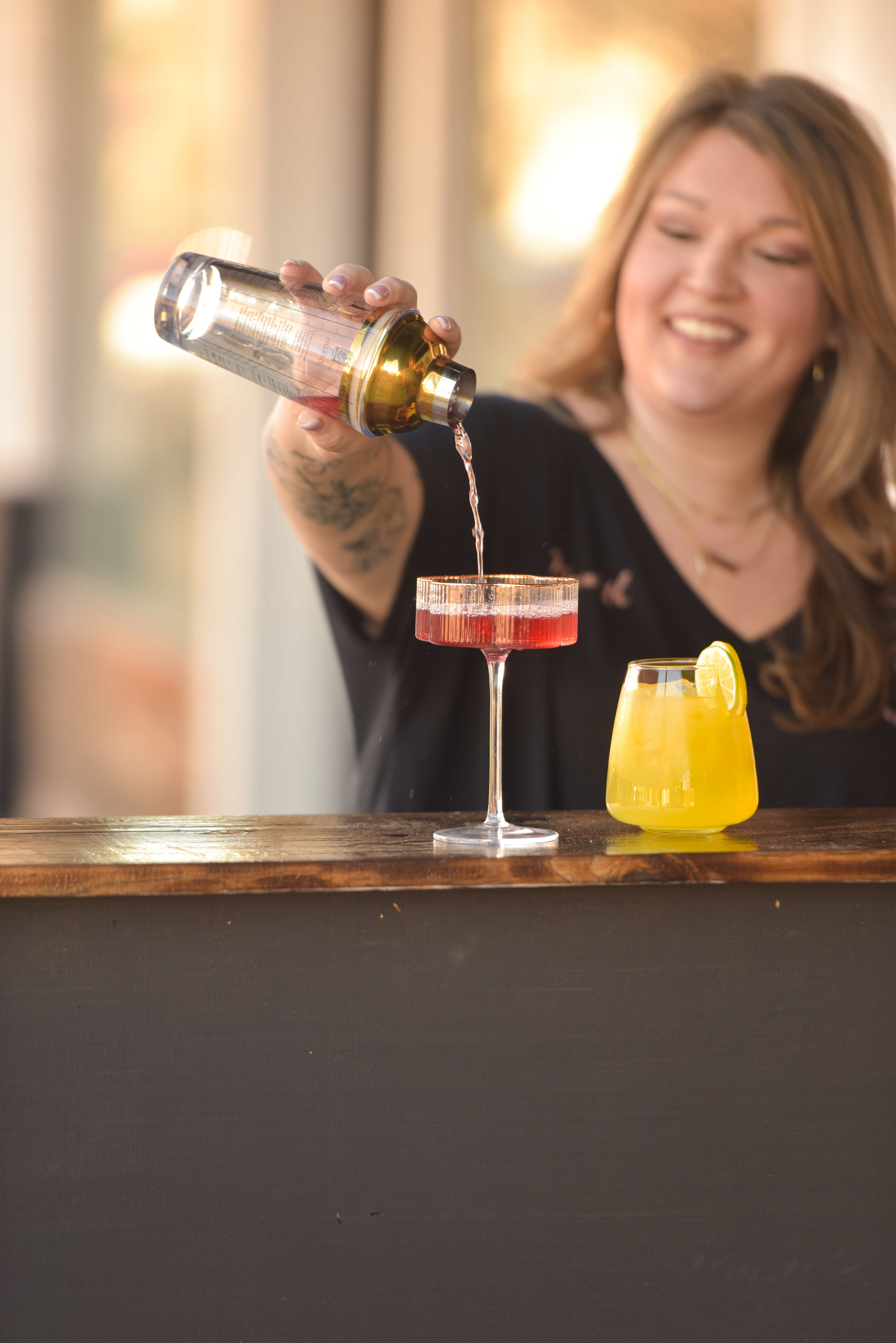 buzzin' and bubbly bartending bartender pouring drink