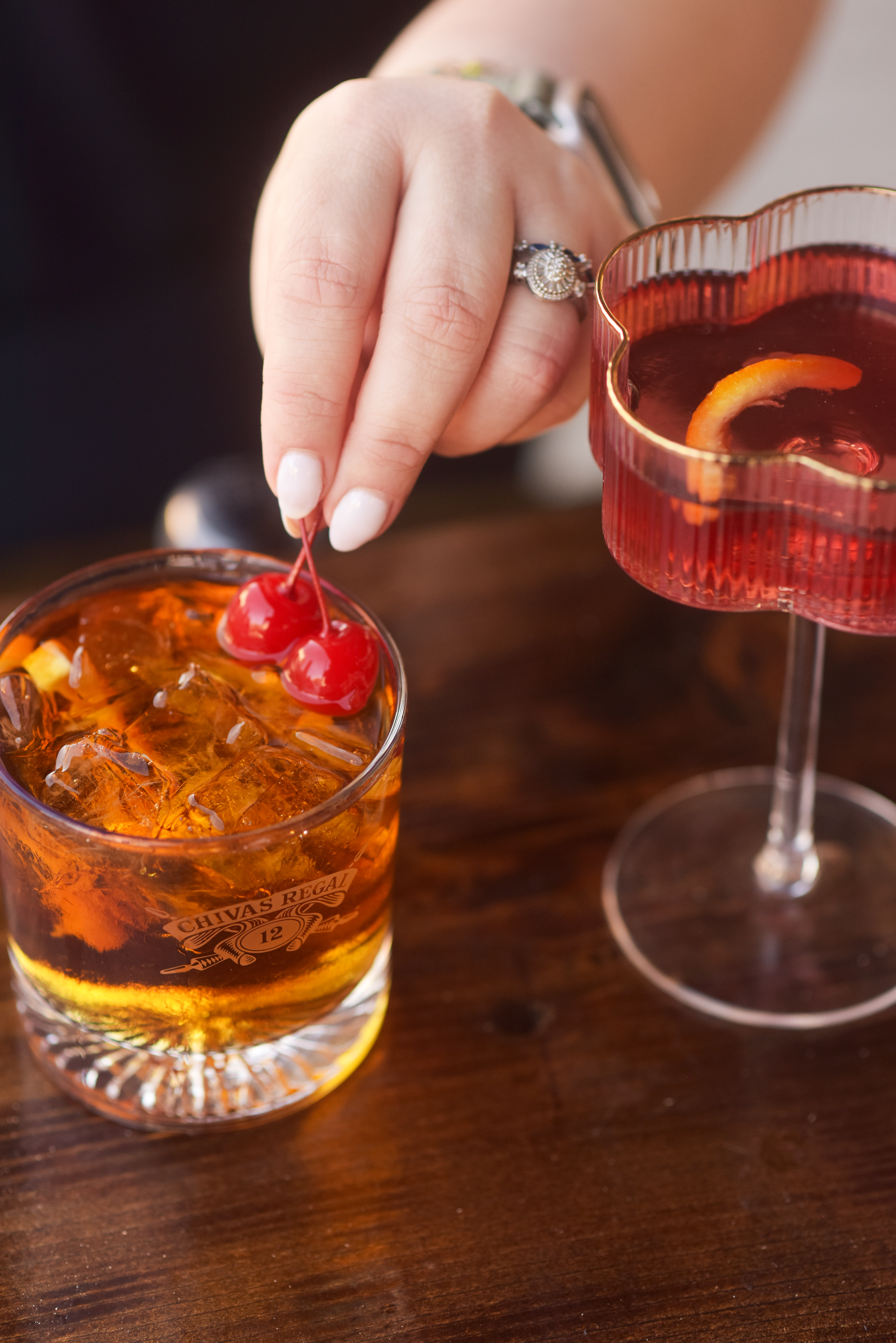 cherry garnish on cocktail